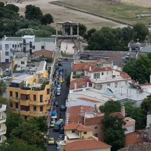 Elevated view of the Temple of Olympian Zeus colossal ruined temple and Arch of Hadrian in central Athens Elevated view of the Temple of Olympian Zeus colossal ruined temple and Arch of Hadrian in central Athens