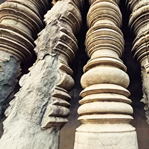 Eroded carved pillars, Angkor Wat Temple
