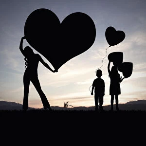 Family love holding hearts