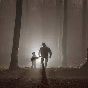 Misty Forest Print of a Father and Son Walking Hand in Hand Misty Forest Print of a Father and Son Walking Hand in Hand