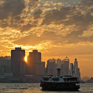 Ferry in Hong Kong with sunset ambiance