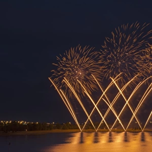 Fireworks reflecting on a lake