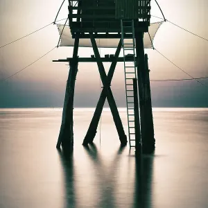 Fishing cabin on stilts (fishery), Atlantic Ocean, France Fishing cabin on stilts (fishery), Atlantic Ocean, France