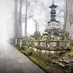 Fog over one of 200, 000 tombs at the old Okunion cemetery in Koya-San, Osaka, Japan