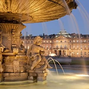 Fountain on Schlossplatz and New Palace at night, Stuttgart, Baden-Wurttemberg, Germany