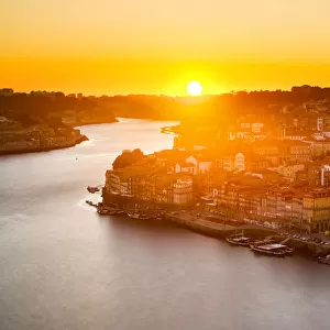 General view of Douro river and city of Oporto al sunset. Porto (Oporto), Portugal