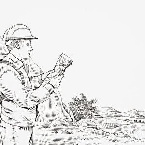 Geologist wearing hard hat, carrying rucksack, looking at a map, with mountains and rocks in background