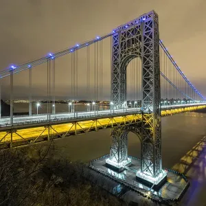 The George Washington Bridge lit in blue lights Print The George Washington Bridge lit in blue lights Print