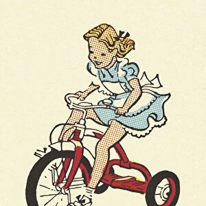 Girl Riding a Tricycle