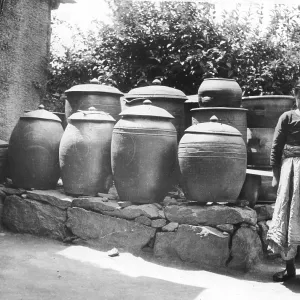 Girl w/ Korean pickle vessels Girl w/ Korean pickle vessels