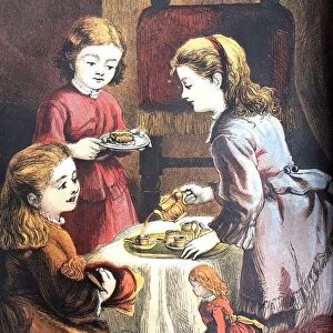 Three girls having a tea party in living room
