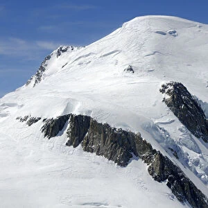 Glaciated peak of Mt. Mont Blanc in Chamonix, Savoie Alps, France, Europe
