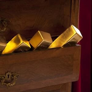 Gold bars in a drawer cabinet