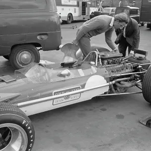 Graham Hill Inspects Car