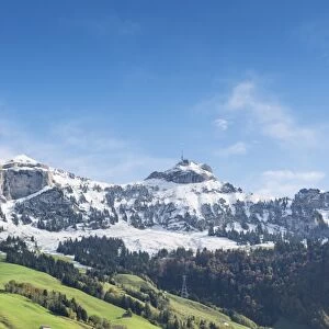 Green pastures in Appenzellerland with the community of Bruelisau and the snow-capped Appenzell Alps, Canton of Appenzell-Innerrhoden, Switzerland, Europe