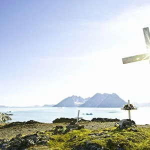 Greenland, Tasiilaq, cemetery with white wooden crosses