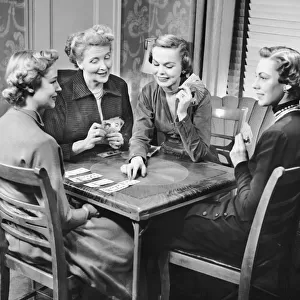 Group of women playing cards