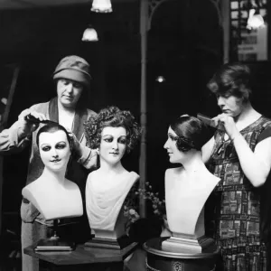 1926 Hair Styles Print: Two women model hairstyles on mannequin heads 1926 Hair Styles Print: Two women model hairstyles on mannequin heads
