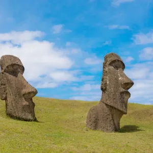 Two half-buried moai statues in Rano Raraku Print Two half-buried moai statues in Rano Raraku Print