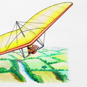 Hang glider above rural landscape