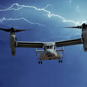 A head-on view of a U. S. Marine Corps Bell/Boeing MV-22 Osprey tilt-rotor aircraft with lightning