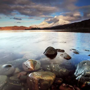 Higland loch mountains winter snow Scotland Higland loch mountains winter snow Scotland