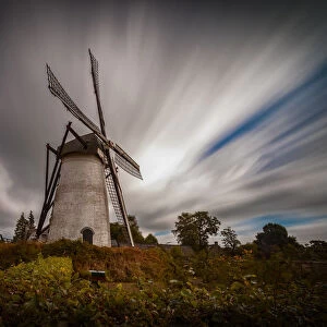 Holland old windmill with clouds, long exposure