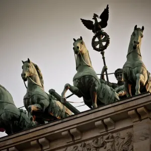 Horse sculptures on roof of building Horse sculptures on roof of building