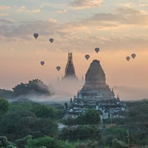 Hot air balloon in the morning fog at bagan myanmar