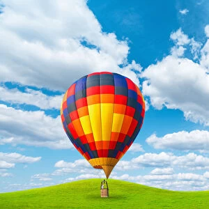 Hot Air Balloon Vertical Landed On Grassy Hills