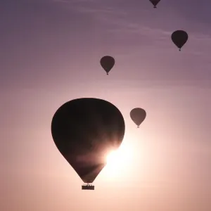 Hot air balloons flying above rock formations, Goreme National Park, Goreme, Cappadocia, Anatolia, Turkey Hot air balloons flying above rock formations, Goreme National Park, Goreme, Cappadocia, Anatolia, Turkey