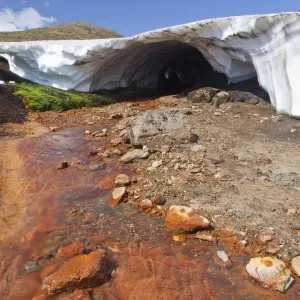 Hot red stream in a volcanic landscape, Eyjafjallajoekull, Iceland, Europe Hot red stream in a volcanic landscape, Eyjafjallajoekull, Iceland, Europe
