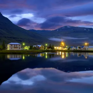 Iceland, Seydisfjordur harbor and houses, dusk