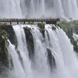 Iguazu Waterfalls and footbridge for tourists, Brazil / Argentina