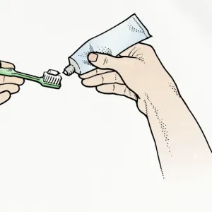 Illustration of squeezing toothpaste on toothbrush