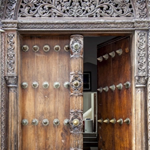 Intricately carved wooden Arab door in Stone Town