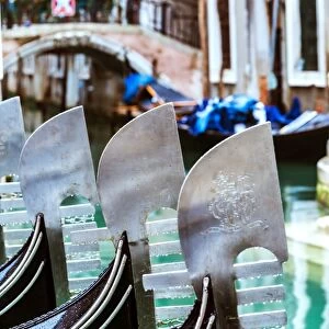 Italy, Veneto, Venice. Row of Gondolas moored