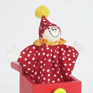 Jack in a box, smiling clown puppet popping out of red wooden box with arms extended to sides, front view