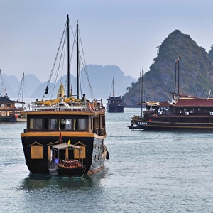 Junks in Halong Bay, a UNESCO World Heritage Site, Vietnam, Southeast Asia, Asia
