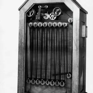 Kinetoscope Print: A wooden stand-up peep show device Kinetoscope Print: A wooden stand-up peep show device