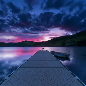 Ladybower Reservoir jetty at sunset. English Peak District