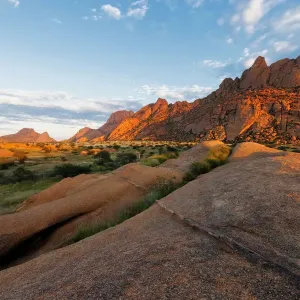 Landscape photo of the Spitzkoppe granite mountains at sunrise. Spitzkoppe, Erongo, Namibia Landscape photo of the Spitzkoppe granite mountains at sunrise. Spitzkoppe, Erongo, Namibia