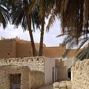 Lane with a pile of mud bricks in the backyards of the oasis of Ghadames, UNESCO world heritage, Libya