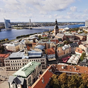 Latvia, Riga, Cityscape of old town and river in distance