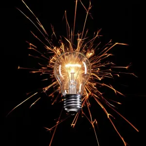 Light Bulb Print on Black Background Light Bulb Print on Black Background