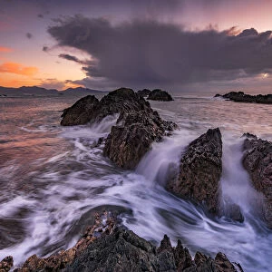 Llanddwyn Island rocks and sea, Anglesey, Wales, UK