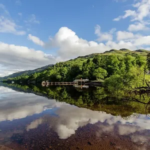 Loch Lomond in reflection on a sunny evening Loch Lomond in reflection on a sunny evening