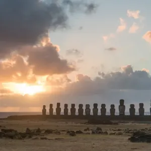 Lone monolithic giant stone Moai statue looking out to sea at Tongariki, Rapa Nui (Easter Island), UNESCO World Heritage Site, Chile, South America Lone monolithic giant stone Moai statue looking out to sea at Tongariki, Rapa Nui (Easter Island), UNESCO World Heritage Site, Chile, South America