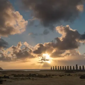 Lone monolithic giant stone Moai statue looking out to sea at Tongariki, Rapa Nui (Easter Island), UNESCO World Heritage Site, Chile, South America Lone monolithic giant stone Moai statue looking out to sea at Tongariki, Rapa Nui (Easter Island), UNESCO World Heritage Site, Chile, South America