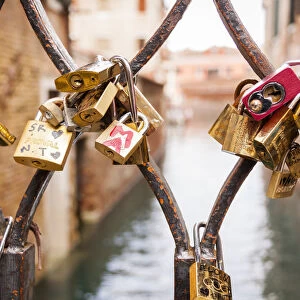 Love locks on a bridge in Venice, Italy